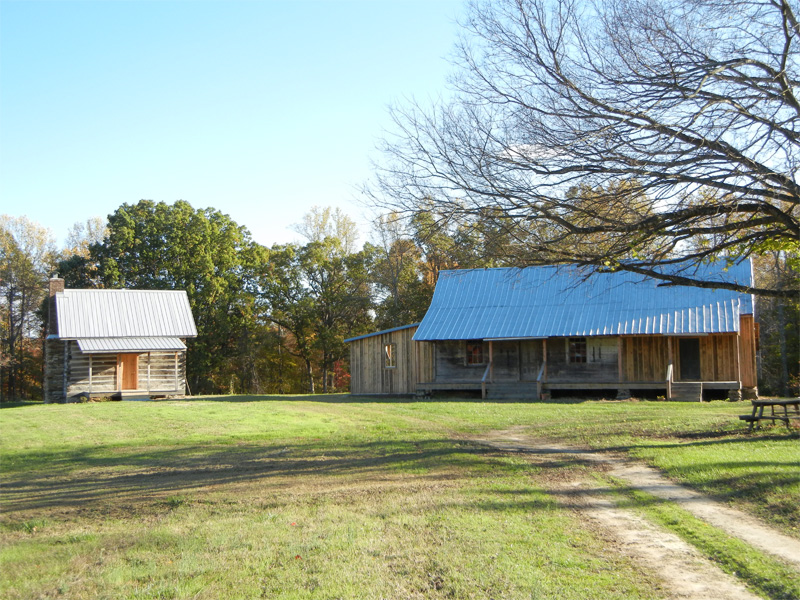 log cabin and house